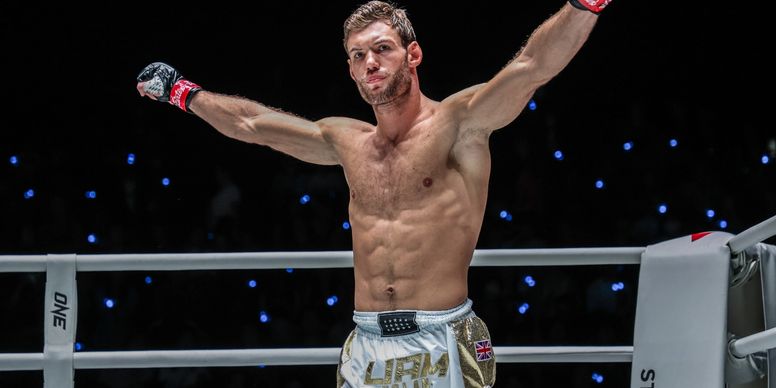 Liam Nolan celebrating victory at ONE Championship Muay Thai event